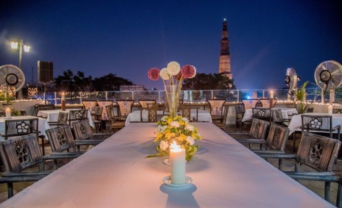 cafe with view of qutub minar